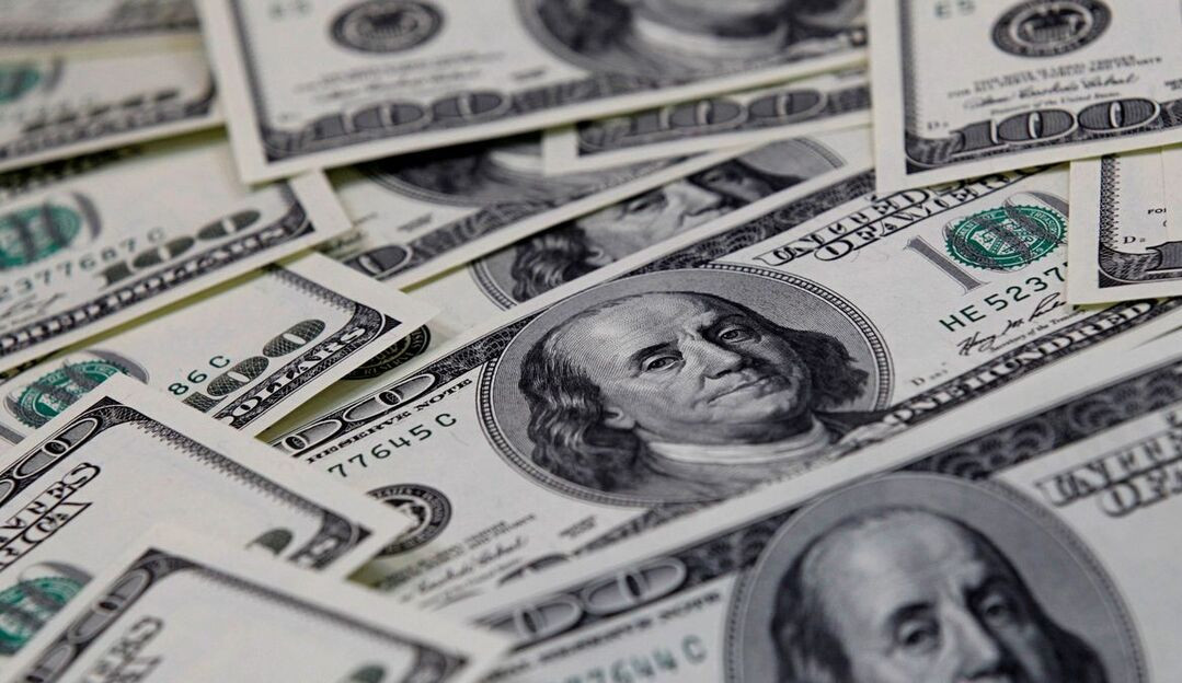 Dólar volta a operar em alta após anúncio do valor do Auxílio Brasil