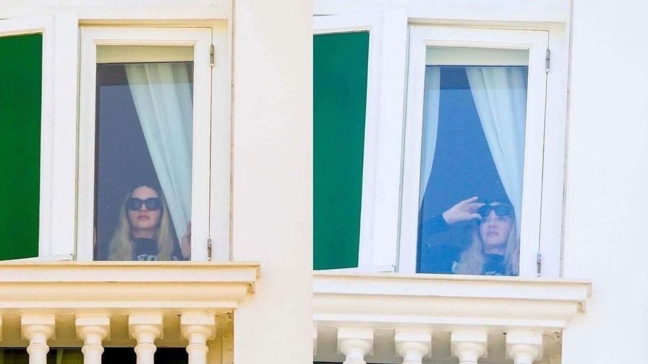 Madonna admirando praia pela janela do Copacabana Palace