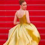 Marina Ruy Barbosa com vestido amarelo no tapete vermelho.