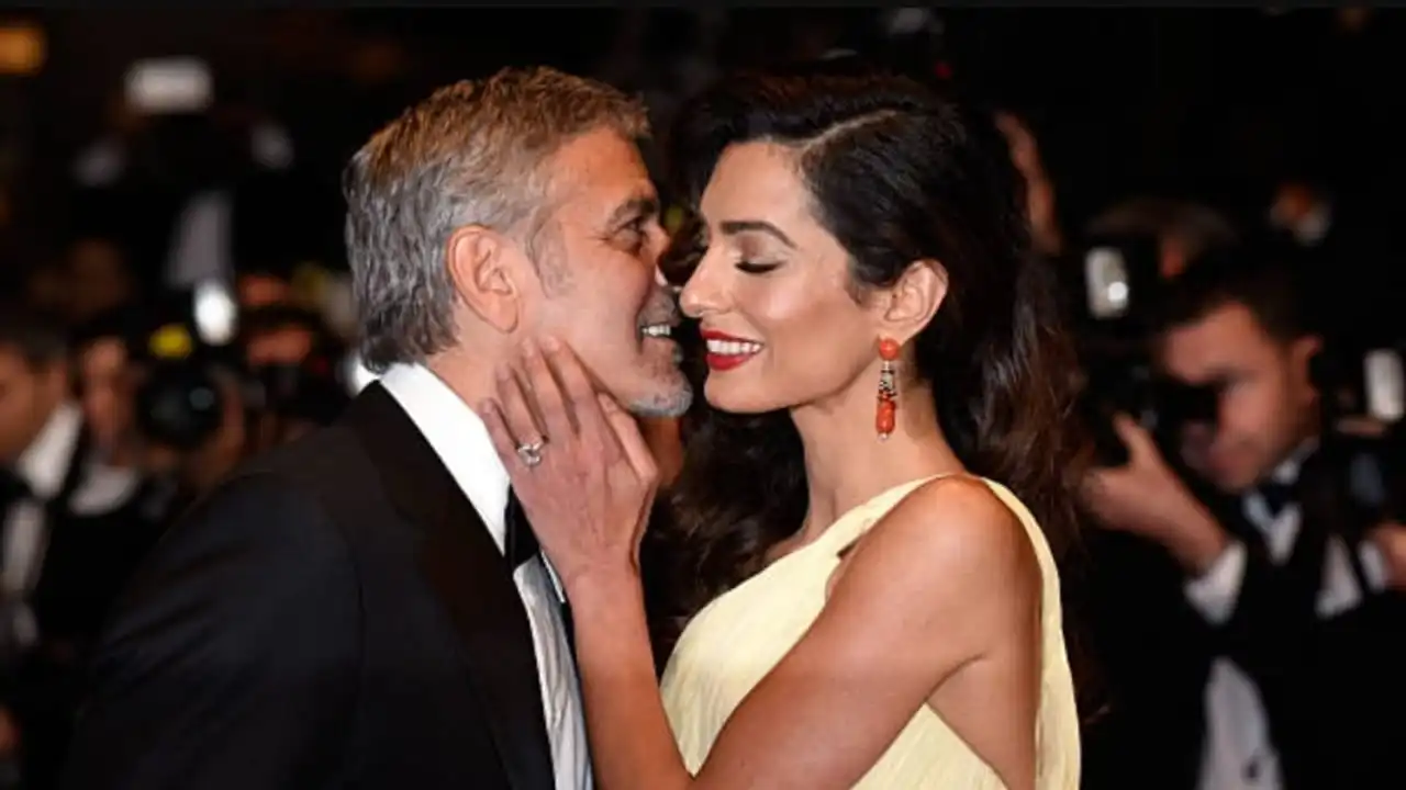 Amal Clooney e George