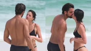 Rodrigo Simas e Agatha Moreira trocam carícias na praia em meio a intervalo de gravações