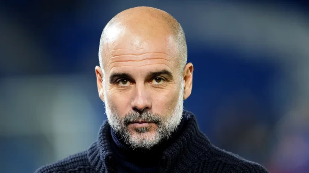 Depois do empate frustrante, Guardiola aparece com marcas em seu rosto