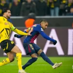 Com gol de Raphinha, Barcelona vence Borussia Dortmund fora de casa