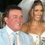 Foto destaque: Amado Batista e Calita Franciele em cerimônia de casamento (Reprodução/Instagram/@karllos_kosta)