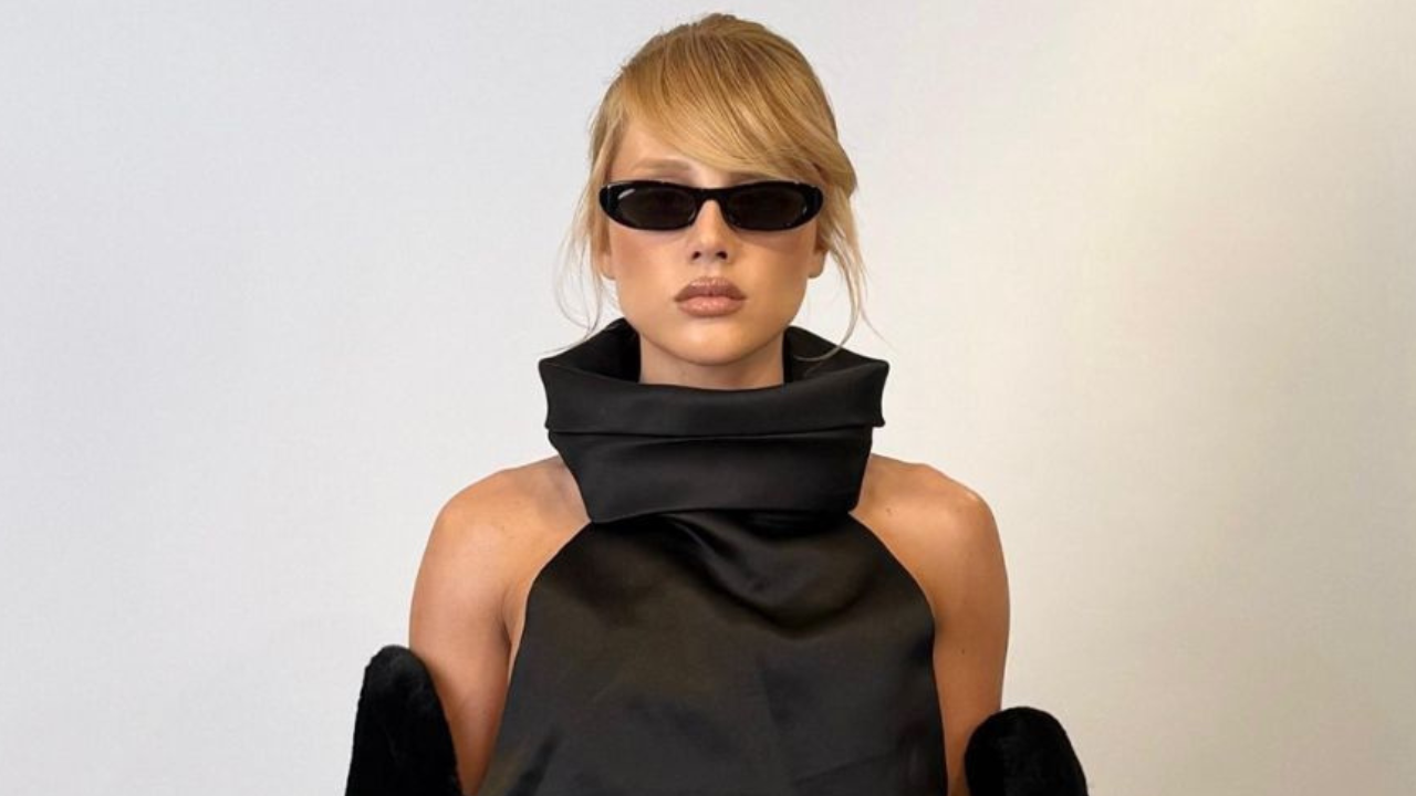 Malu Borges chama atenção com styling marcante em cetim preto